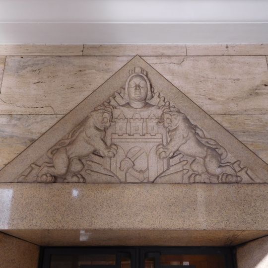Relief with Prague coat of arms at the Municipal Library main building