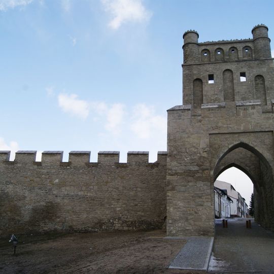 City walls with Krakowska Gate in Szydłow