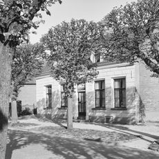 Huis van beganegrond met twee dakkapellen