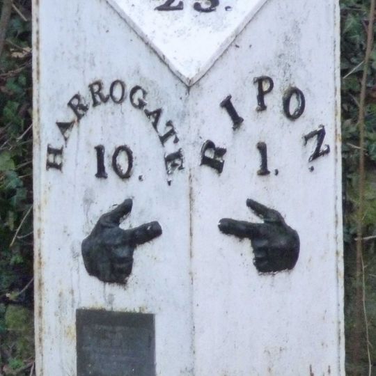 Milestone, at traffic island S of Ripon