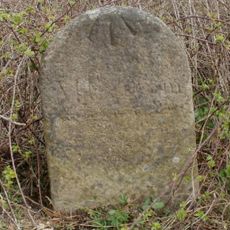Milestone At National Grid Reference St6977 8999