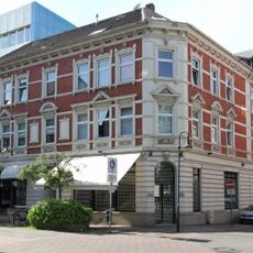 Wohn- und Geschäftshaus Mont-Cenis-Straße 7 / Schulstraße 11