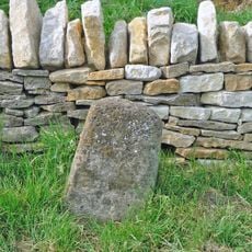Milestone, Bicester Road; opp. N end of Old People's bungalow (No. 13), and opp. slip road down to A44