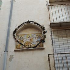 Ceramic panel of Saint John the Baptist, Saint Acisclus, and Saint Victoria