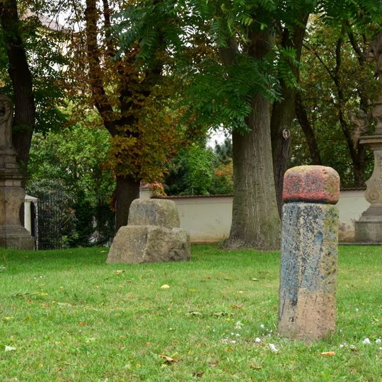 Milestone nearby the church in Údlice