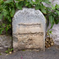 Milestone, Ringmore; on bend by entrance to St Nicholas Church
