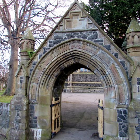 Lychgate and Boundary Wall to Saint John's Churchyard