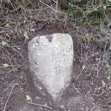 Milestone, half mile NE of "Chilley", opp. lay-by