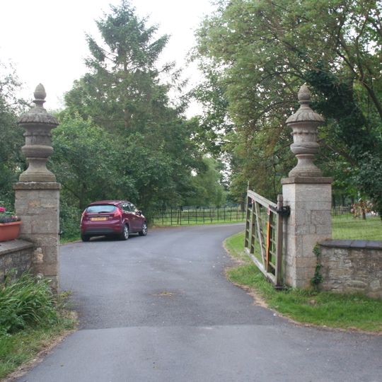 Gate piers and urns at main entrance to Staunton Hall
