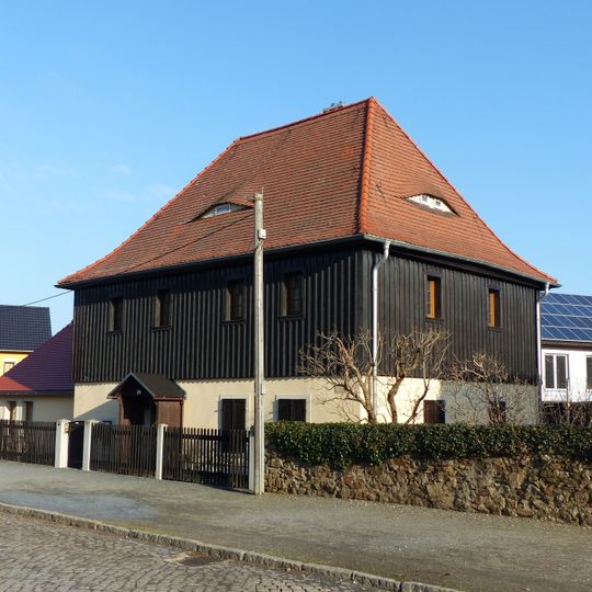 Wohnhaus mit angebautem Nebengebäude und Einfriedung Markt 6