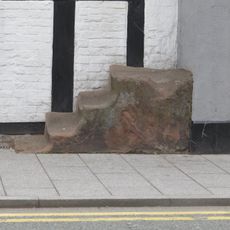 Mounting block at right hand of numbers 26-30 (even)