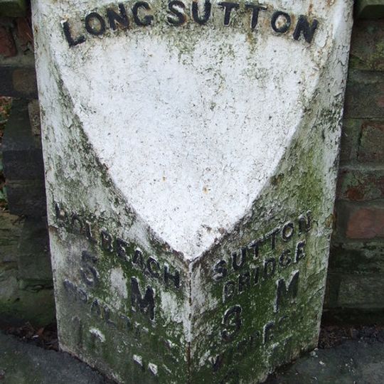 Milepost, London Road, outside churchyard