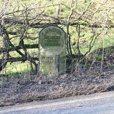 Mile post, north of old railway bridge at NGR 173 512