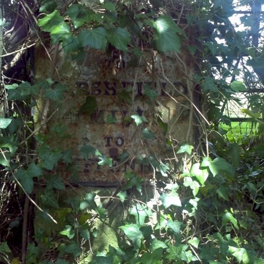 Milestone, Giddea Hall, opp. Car Park; top of bank