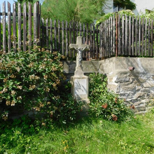 Kříž na návsi v Přímělkově