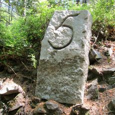 Milestone, 300m W of Eastern gateway into Yarner Wood on trackway