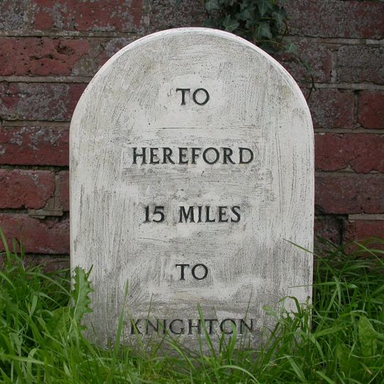 Milestone, West Town, in front of "Little Green"