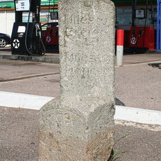 Milestone, Milestone Garage in Hand & Pen, 100m W of Church Road