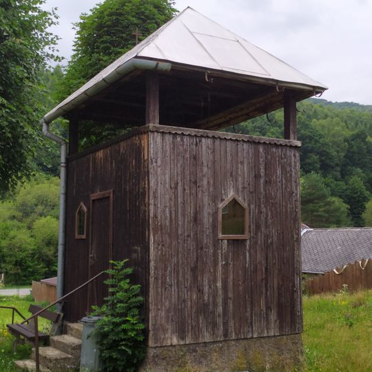 Wooden bell tower in Kolbasov