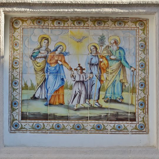 Ceramic panel of the Sacred Family at Eduardo Torres street