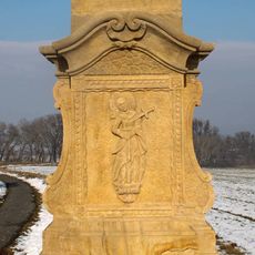 Kříž v Řimicích jižně od vesnice