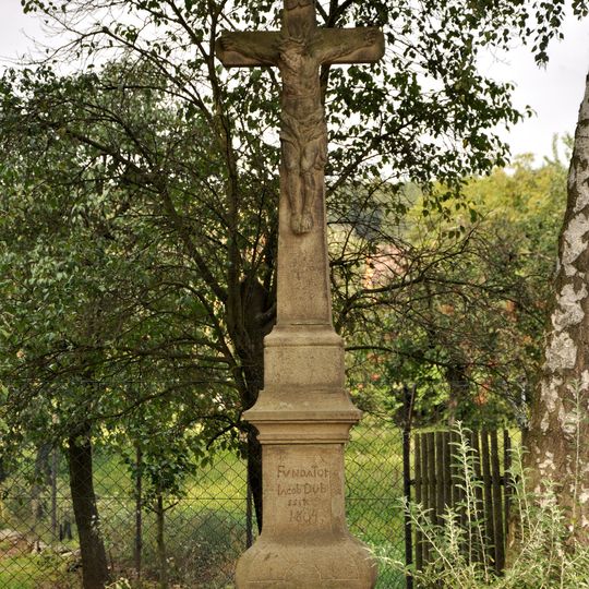 Stone wayside cross in Padochov