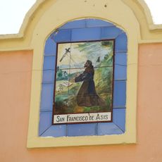 Ceramic panel of Saint Francis of Assisi at Sant Domènec street