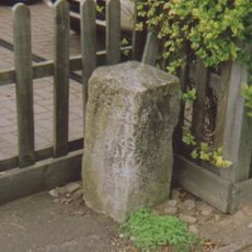 Milestone, Maidstone Road, by entrance to Fairtrade shop, N of Ringden Ave and catholic church