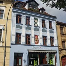 Wohnhaus in geschlossener Bebauung, mit originaler Ladenfront um 1910 Nikolaigraben 6