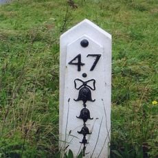 Milepost, jct with Isfield Road, N of the Old Ship PH