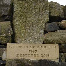 Milestone, E of Cowling, Xrds Pole Road/Buckstone Road