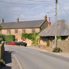Castle Farmhouse And Attached Outbuildings To North