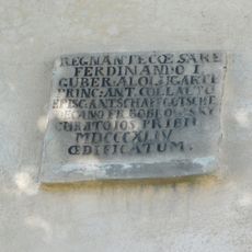 Pamětní deska na kostele v Předíně