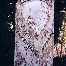 Milepost, c.1/5 mile N of farm and X-tracks