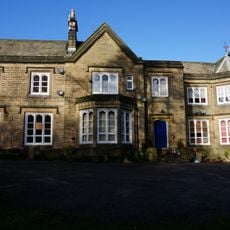 Haddon House with attached wall and archway