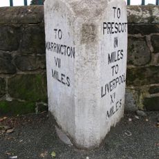 Milestone, Warrington Road; 50m W jcn School Lane