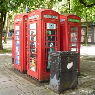 Group Of Four K6 Telephone Boxes Outside Number 43