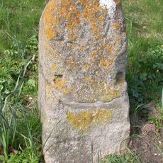 Milestone, centre of village, by village hall