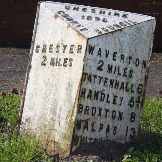 Milepost, almost under A55 bridge, by car showroom