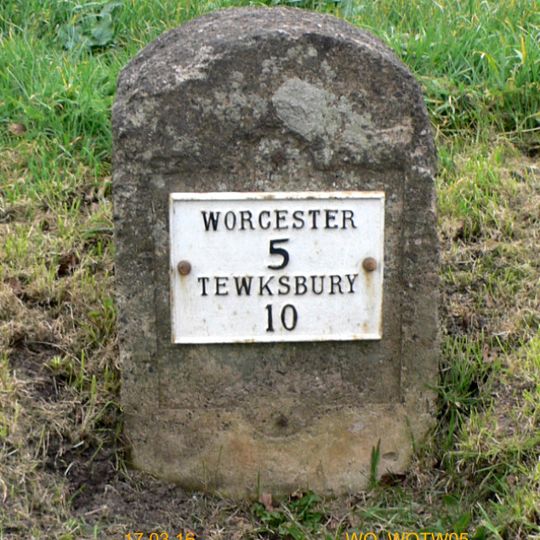 Milestone, Baynhall, on pull-in, 30m N of car sales garage