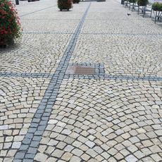 Pamětní deska Nejstaršího pivaře na náměstí Svobody v Žatci