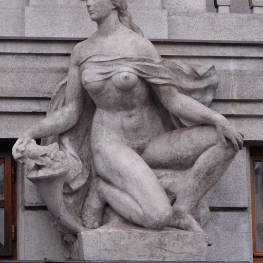 Statues of woman and man at Nad štolou 6