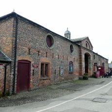 Stable block and barn to Home Farm