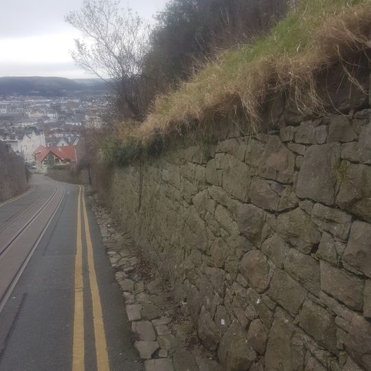 Retaining wall to garden of No15