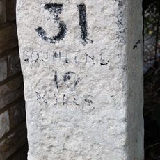 Milestone On North Verge In Front Of Rockhaven And Approximately 30 Metres West Of Church Road
