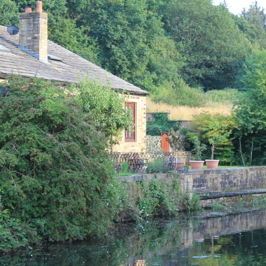 Revetment Wall To Whitecote House With Railings And Gate To Canal