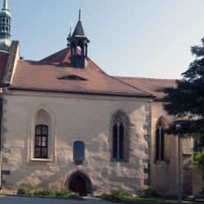 Church of the Holy Spirit and former hospital in Most