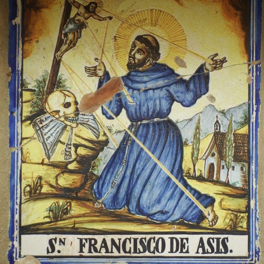 Ceramic panel of Saint Francis of Assisi at Calvari street