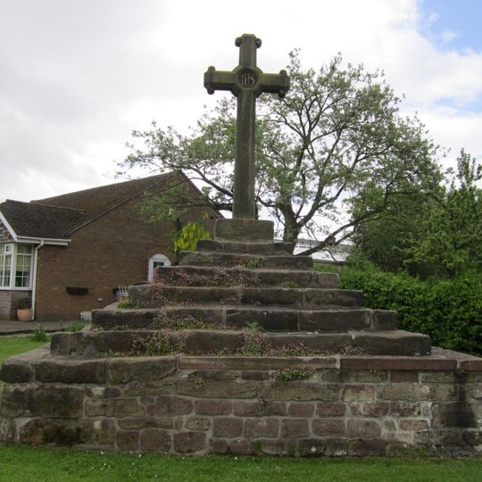 Standing cross on the village green, 30m south east of the junction of Carr House Lane and Lady Green Lane