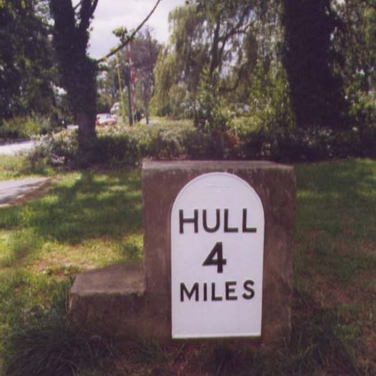 Milestone, At W end of Bilton, beside roundabout leading to Asda supermarket.